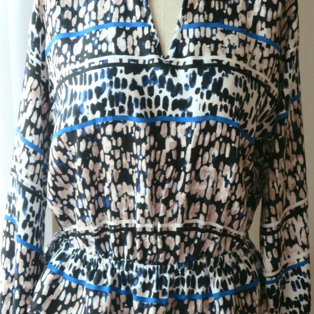 Jennifer Lopez Black and White Blouse with Blue Accents